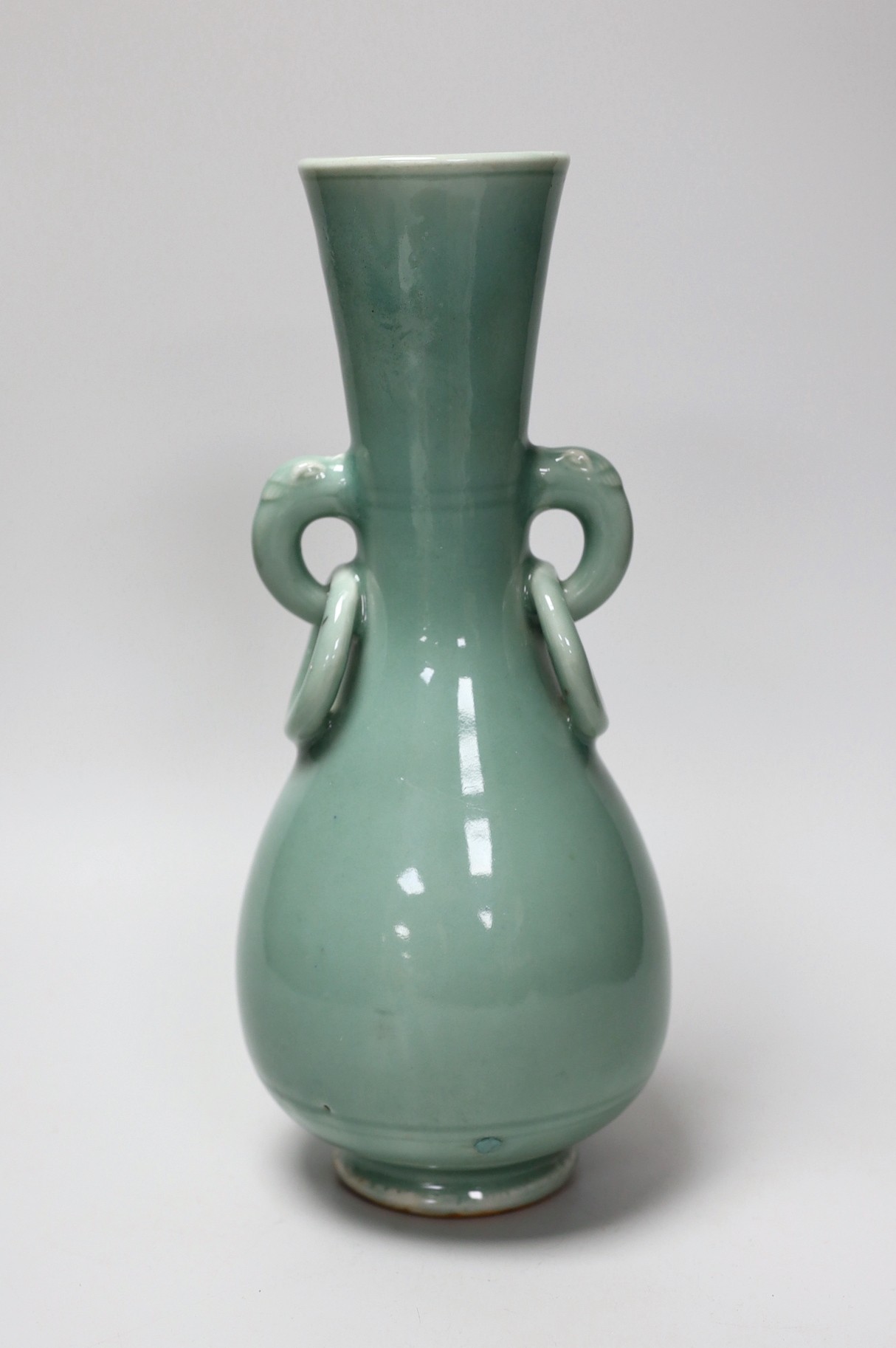 A Chinese celadon glazed two handled vase. 28cm high
